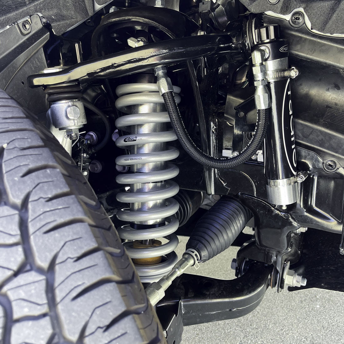 Radflo 2.5 Front Coilover Kit Toyota Tacoma 2024+ With Remote Reservoir And Compression Adjuster Extended For Use With Aftermarket Upper Control Arms 2.5″ Lift