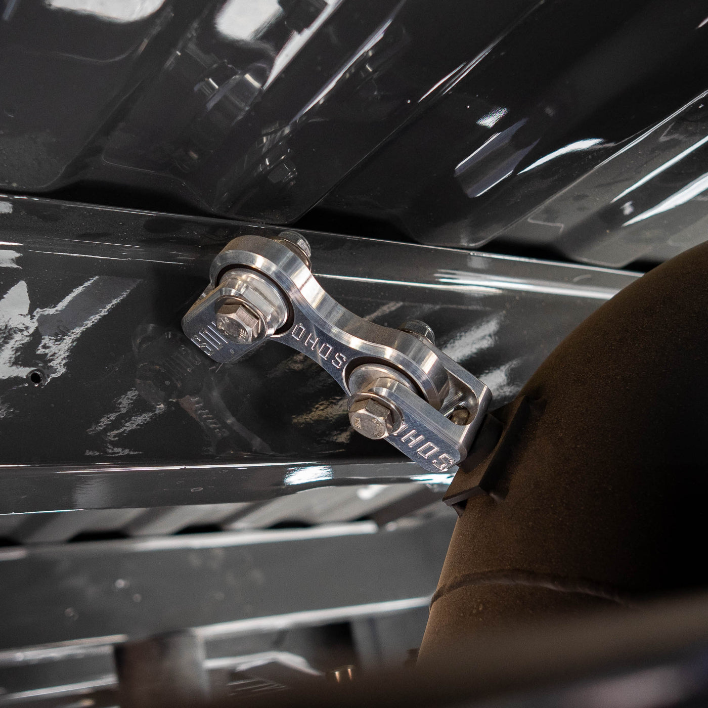 SDHQ Built Billet Exhaust Hanger Clevis Bracket installed