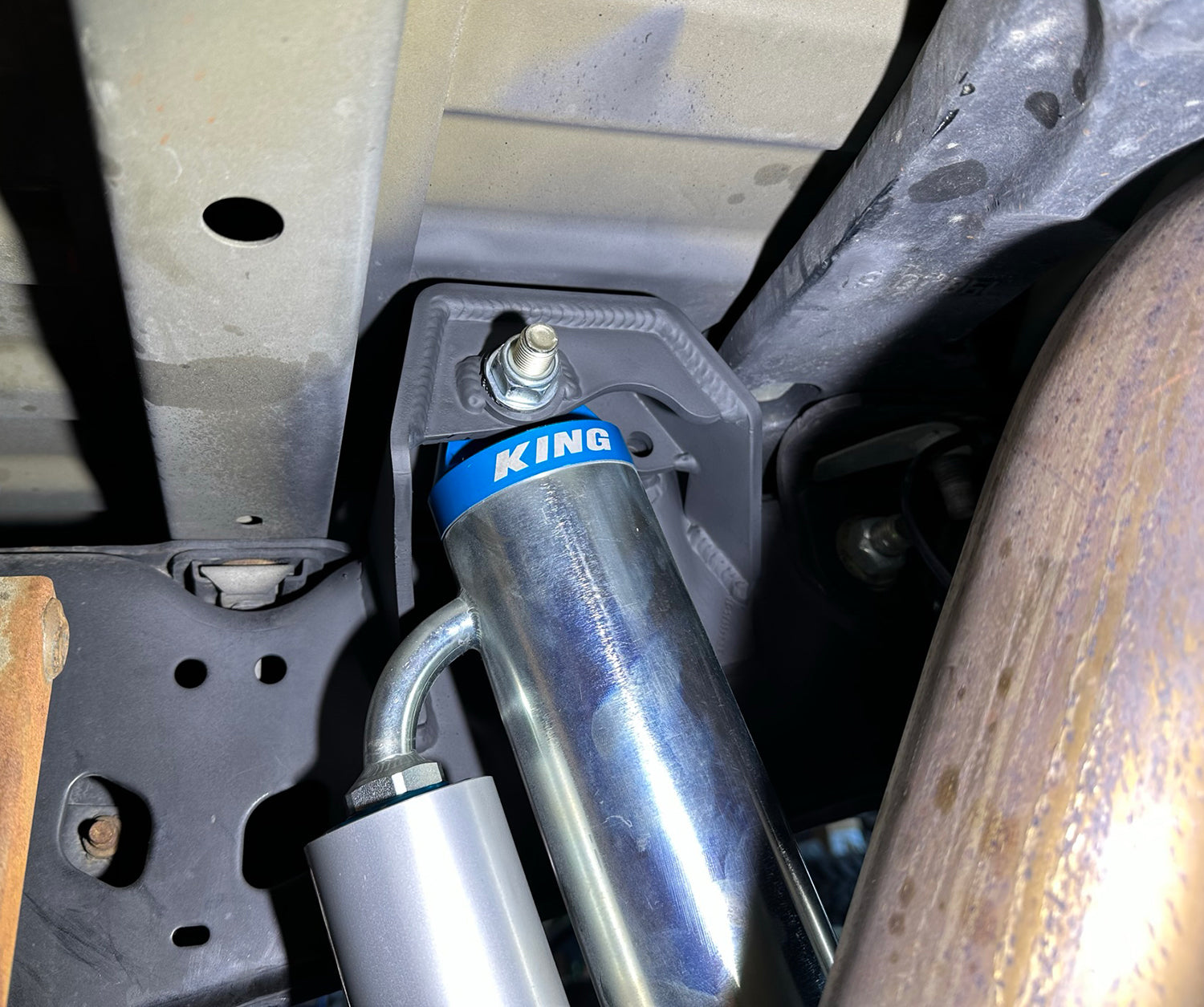 17-24 FORD F250/350 4X4 WELD IN REAR SHOCK MOUNT, PAIR Close-up Display on Vehicle