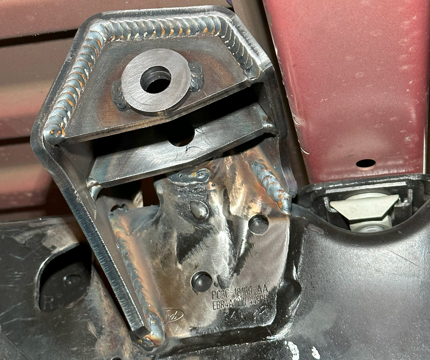 23+ Ford F250/350 4X4 WELD IN REAR SHOCK MOUNT, PAIR Close-up Display on Vehicle