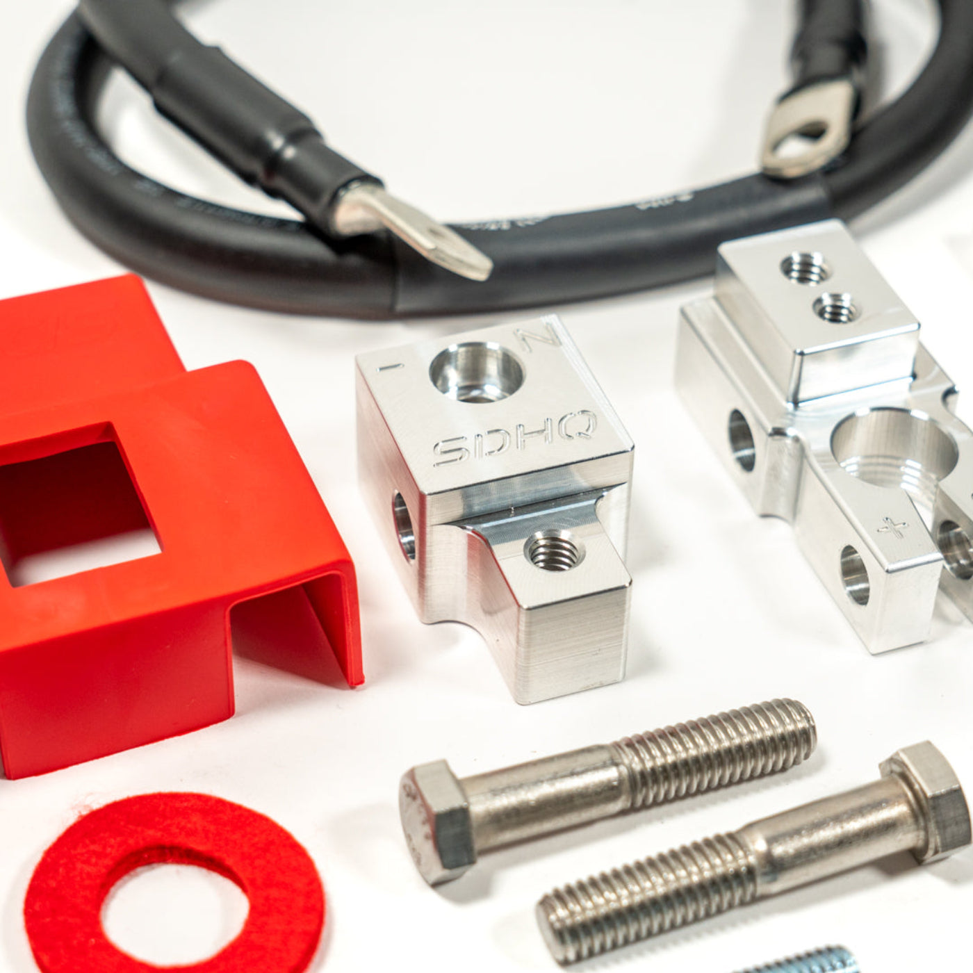 2025 Ram 1500 RHO SDHQ Built Billet Battery Terminal Kit display of included parts and hardware - CLOSE-UP