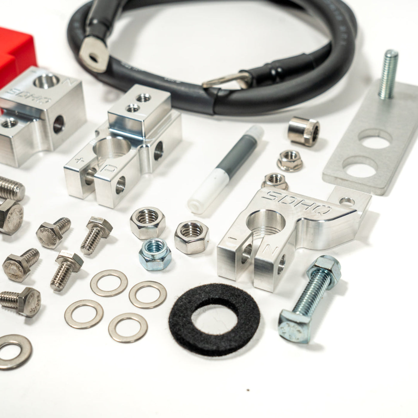 2025 Ram 1500 RHO SDHQ Built Billet Battery Terminal Kit display of included parts and hardware - close-up