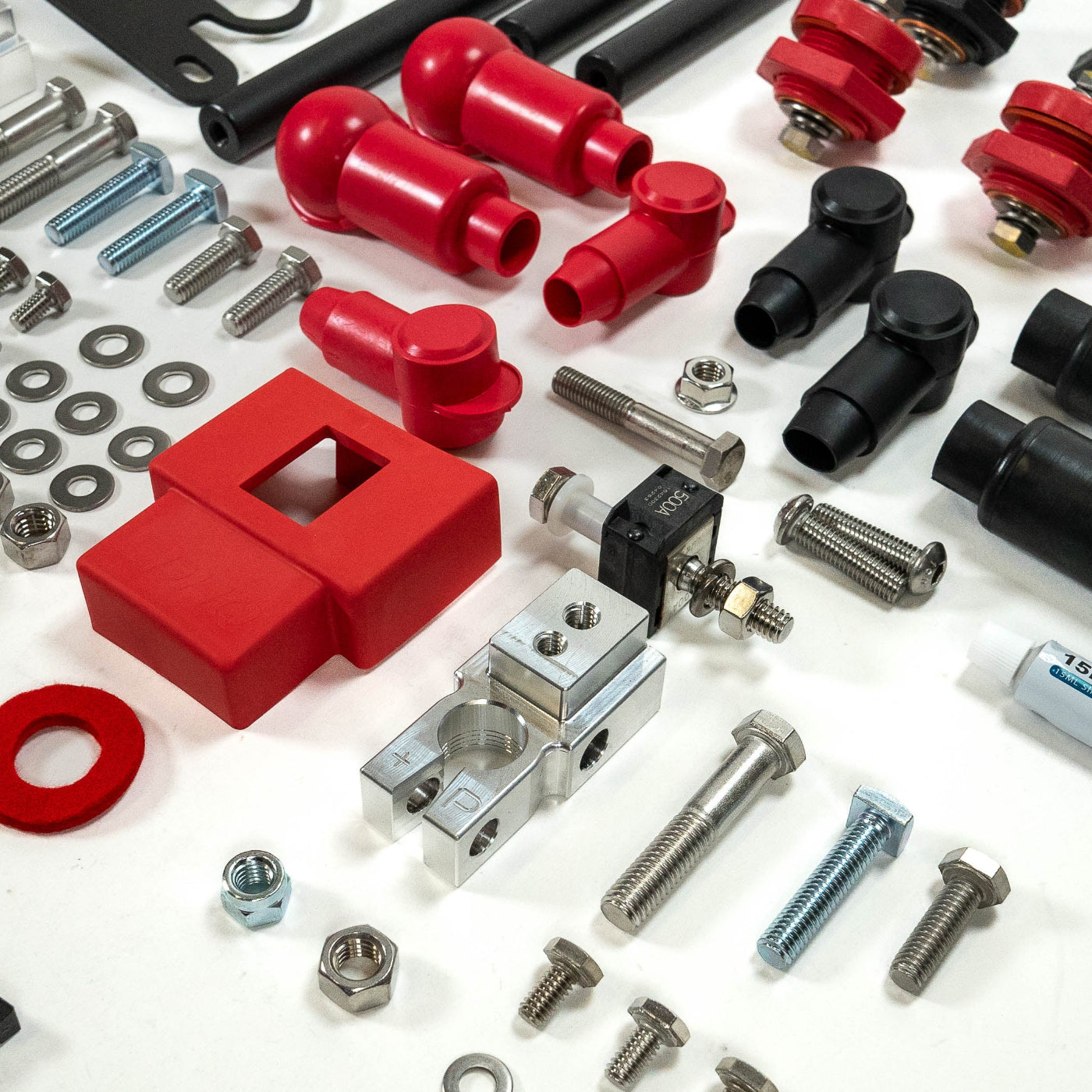 '24-25 Tacoma SDHQ Built Under Hood Power Solution Kit display of included parts and hardware