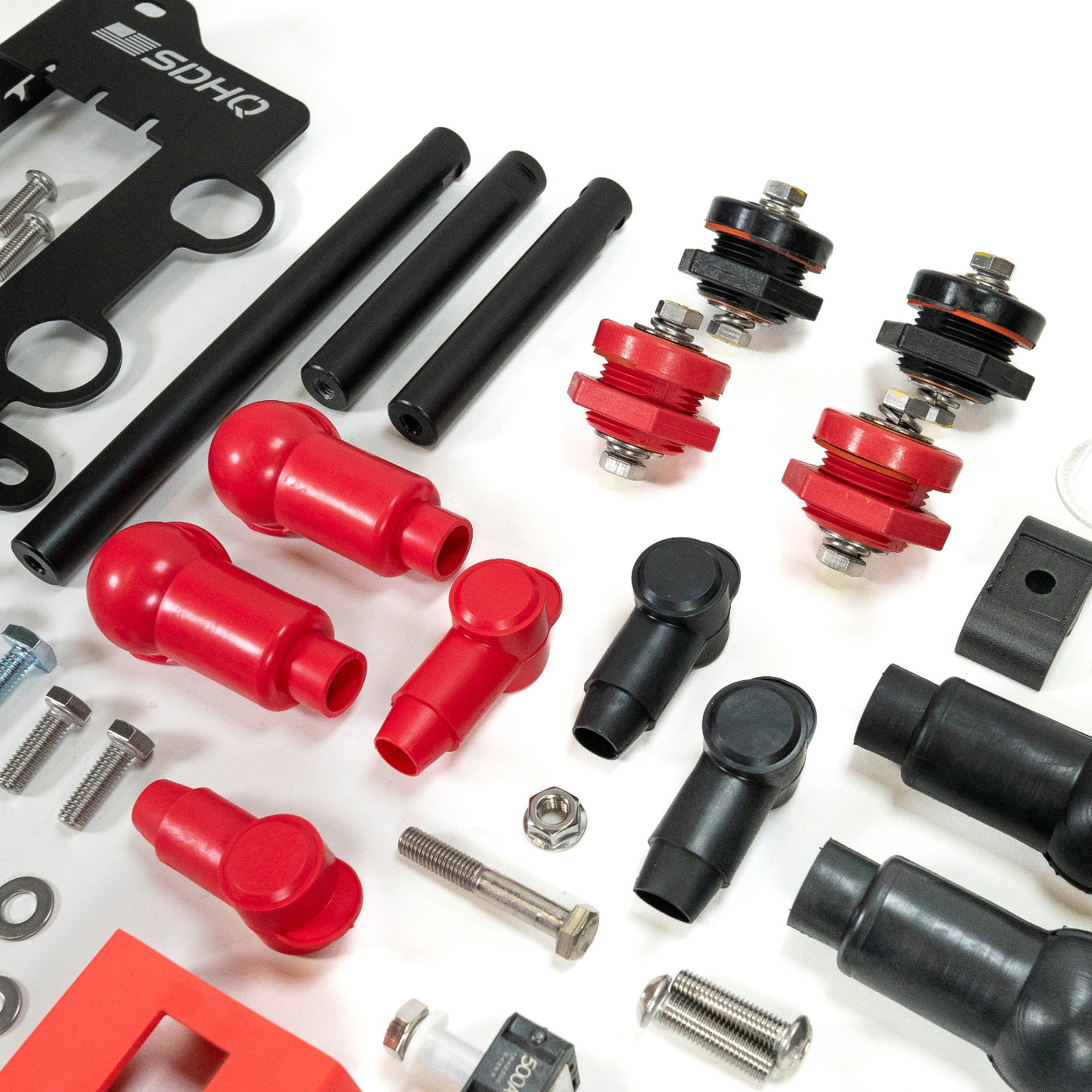 '24+ LC250 SDHQ Built Under Hood Power Solution Kit display of included parts and hardware - close-up
