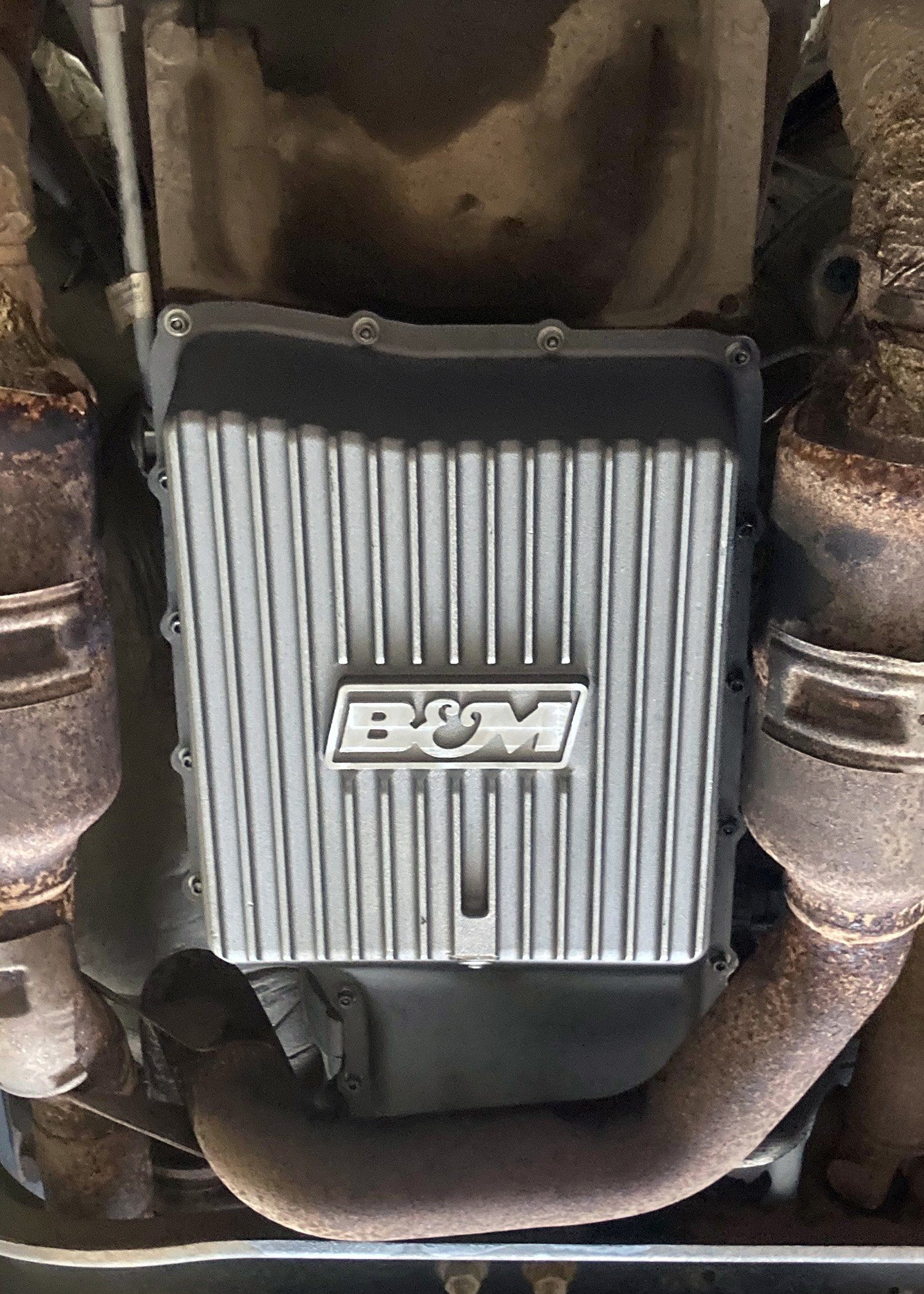 '11-21 Ford F250/F350 B&M HI-TEK Deep Transmission Pan - Natural Drivetrain B&M display on Vehicle