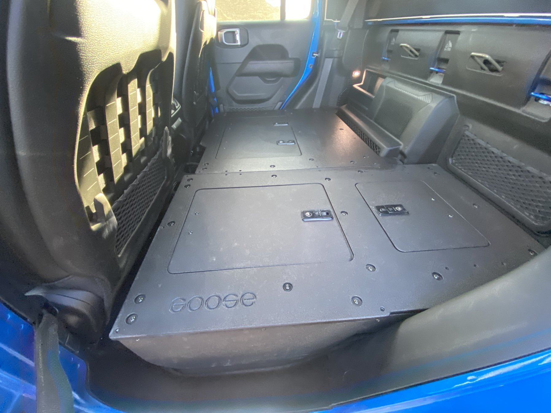 '19-23 Jeep JT 4 Door Goose Gear 2nd Row Seat Delete Plate System - High Platform Display in vehicle