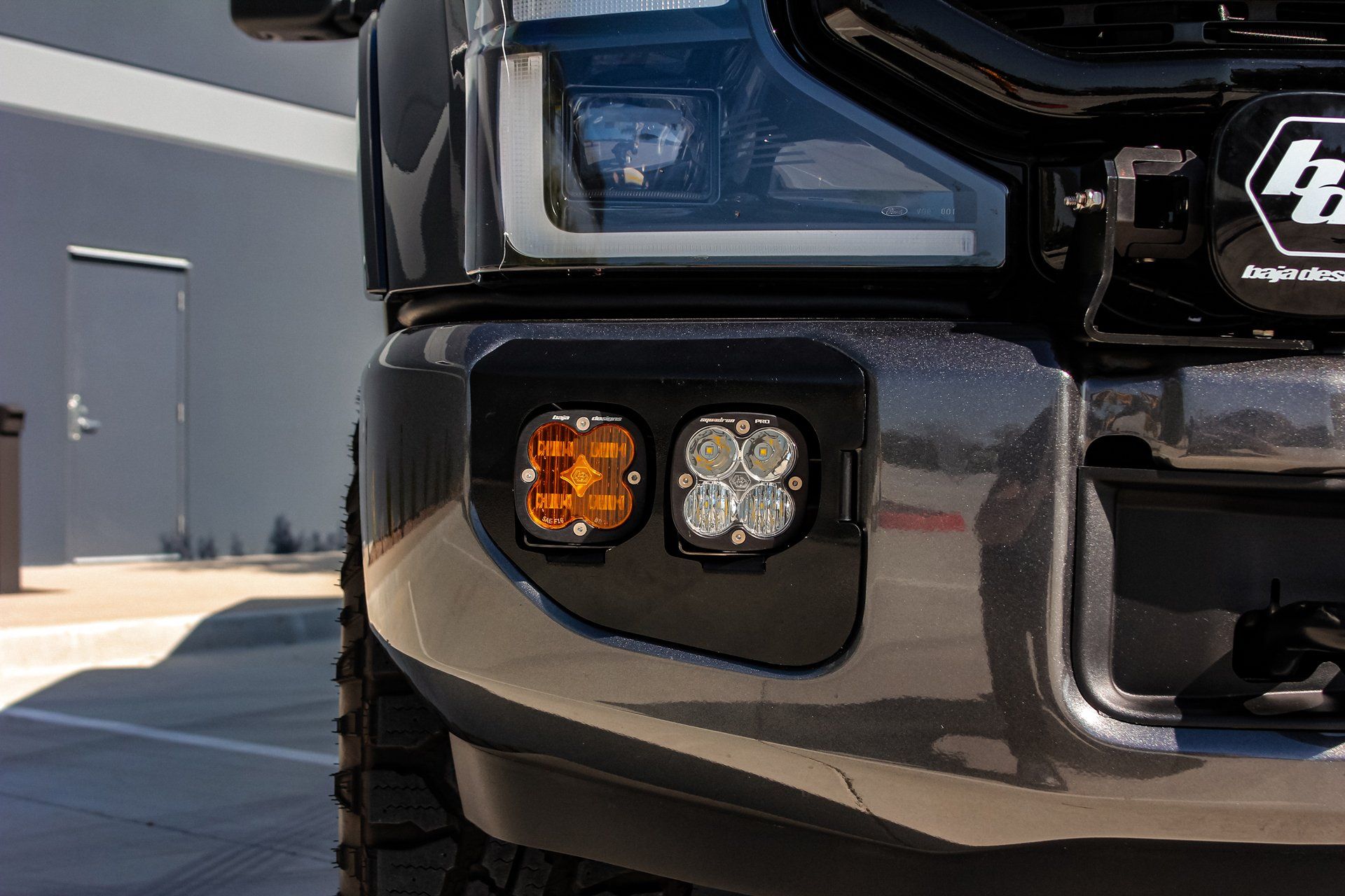 '20-22 Ford F250/350 Baja Designs Squadron Sport/SAE Dual Fog Light Kit Close-up Display on Vehicle (front view)