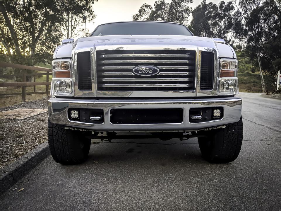 '99-10 Ford Super Duty Fog Pocket Kit Lighting Baja Designs Display on Vehicle (front view)