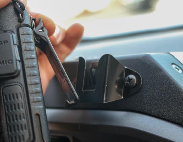 CB Mic and Handheld Radio Holder Close-up Display in Vehicle