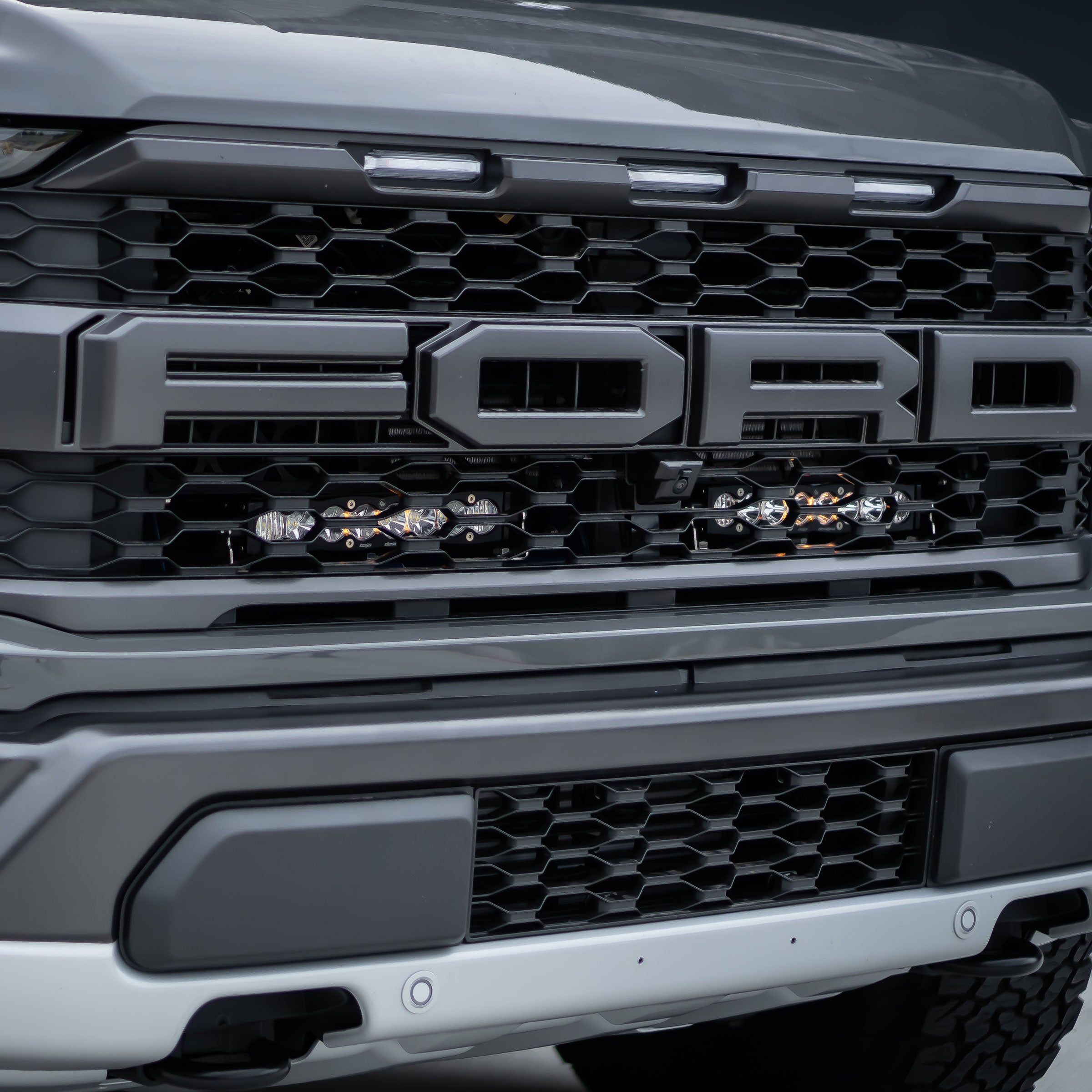 21-22 Ford Raptor Baja Designs S8 Light Bar Behind the Grille Kit display on Vehicle