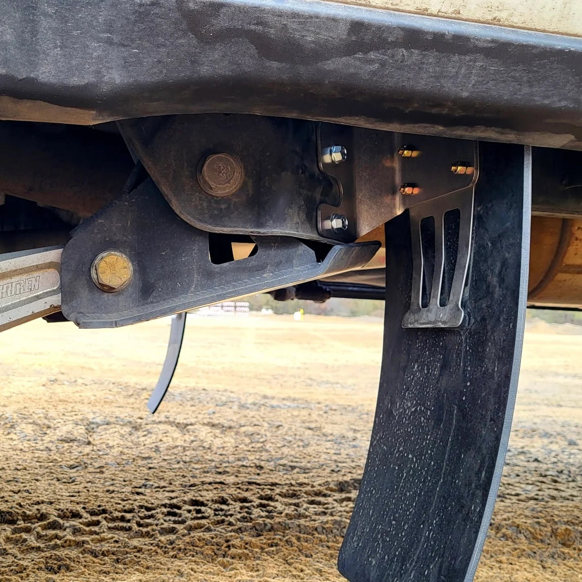 2014-2026 RAM 2500/PW MID-FLAP SHOCK GUARDS