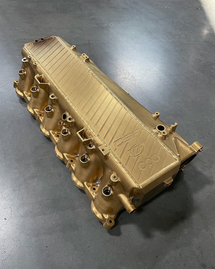 A90 Supra / BMW B58 Charge-Air Cooler Manifold Front View Gold
