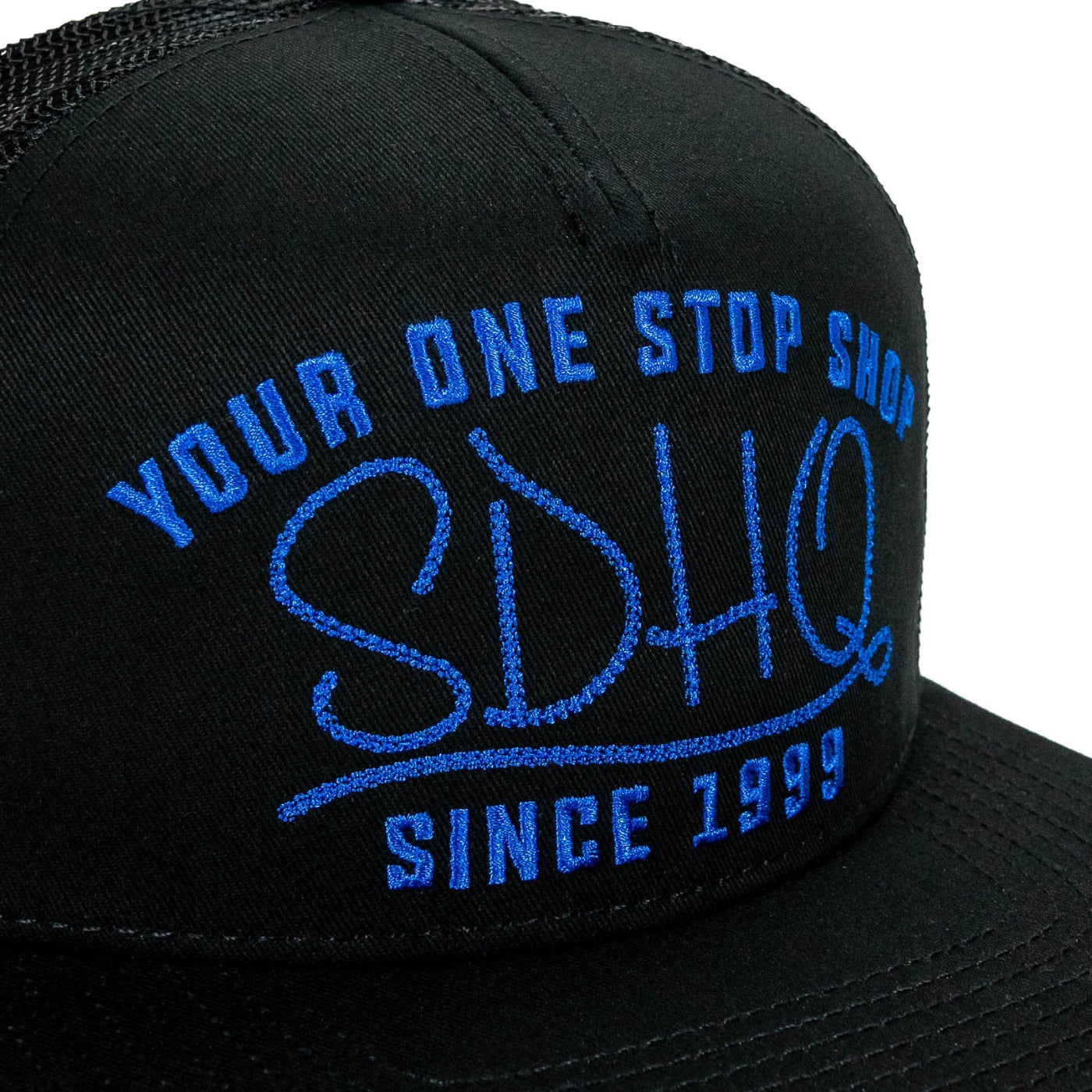 SDHQ One Stop Shop Trucker Hat | Blue Embroidery close-up 
