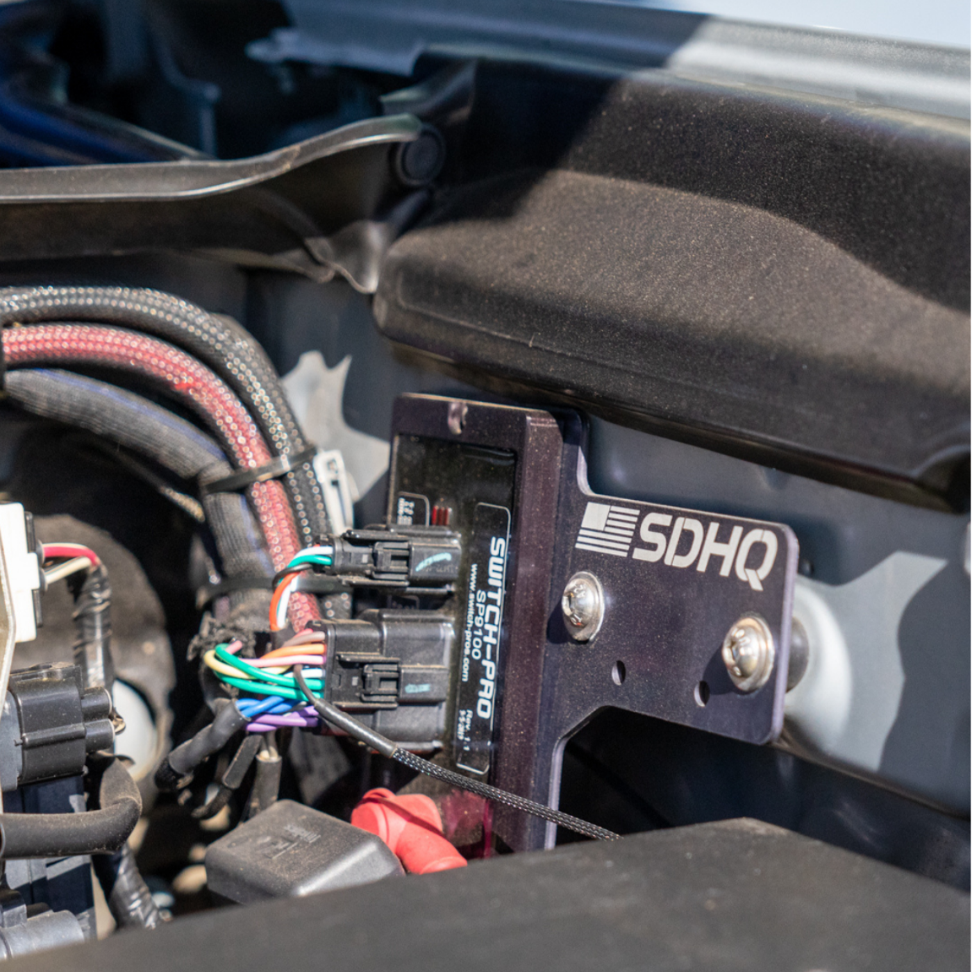 '16-23 Toyota Tacoma SDHQ Built Complete Overhead RCR-FORCE-12 Mounting Kit display of included power module mount installed 