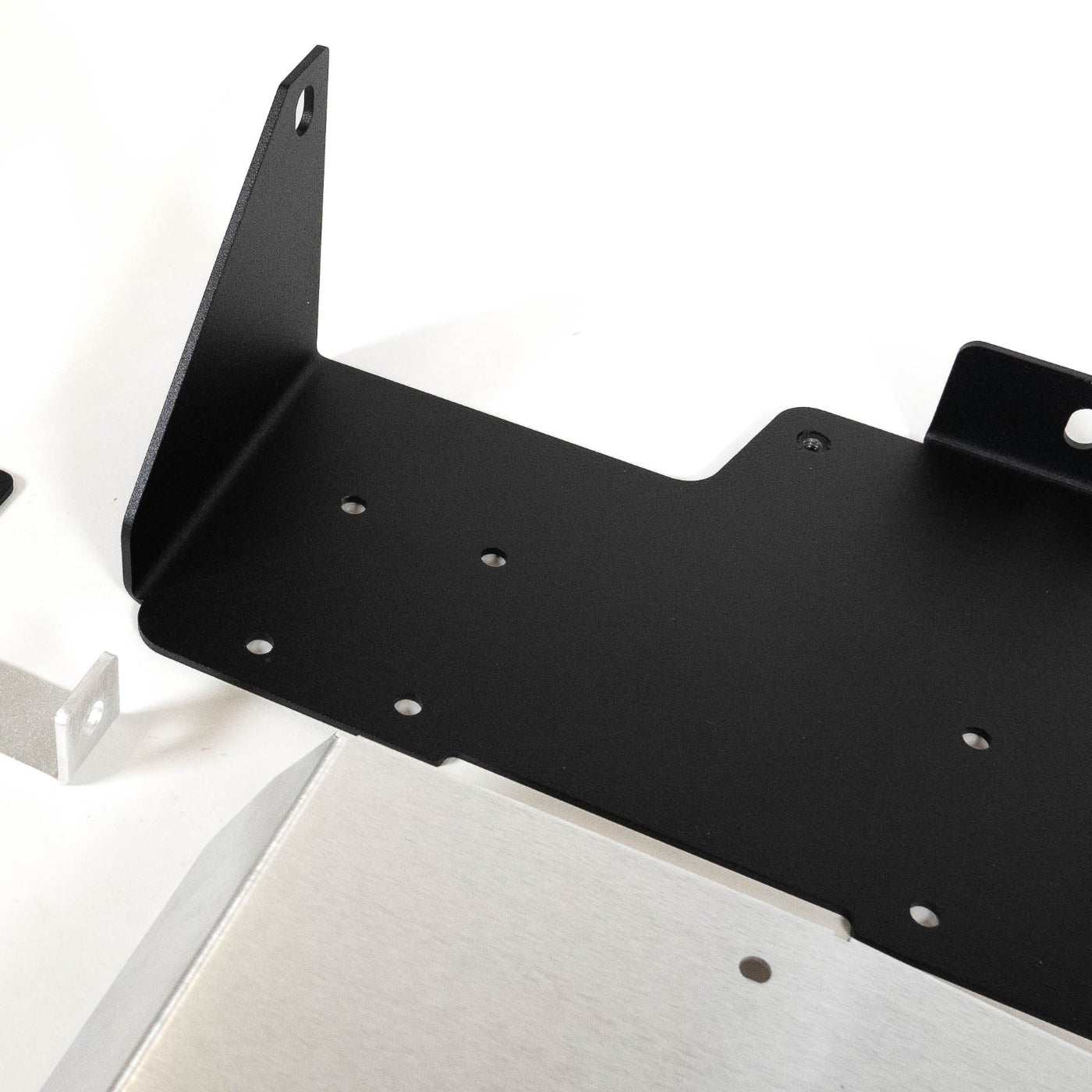 SDHQ Built 2025 4Runner ARB Twin Air Compressor Mount display of included parts and hardware - close-up 