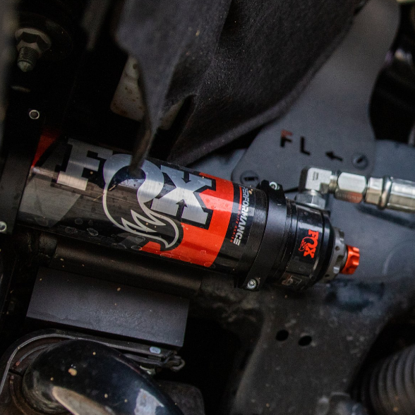 '22-23 Toyota Tundra FOX 2.5 ELITE SERIES RR Coilovers & Rear Shocks (w/ 1.5-3" Rear Lift) w/ Upper Arms & Trailing Arm Combo Kit Close-up Display on vehicle 