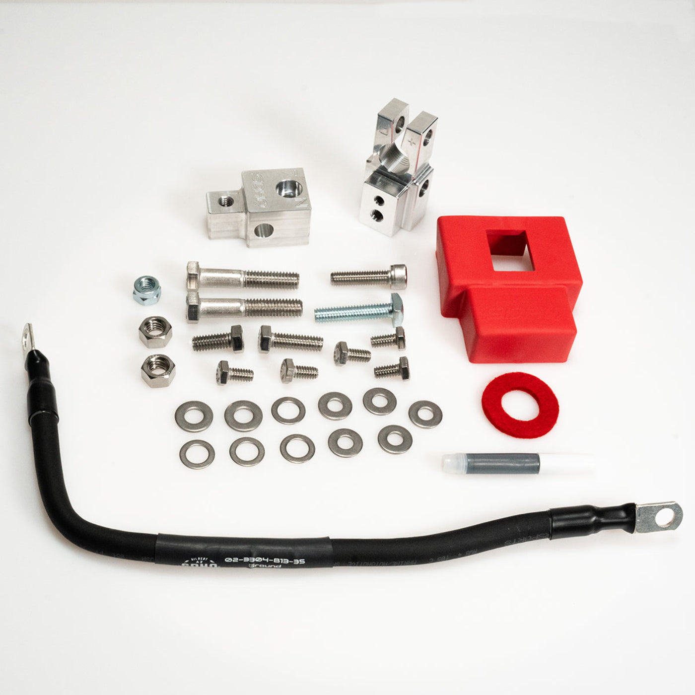 '22-25 Toyota Tundra SDHQ Built Billet Battery Terminal Kit display of included parts and hardware 